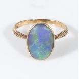 A 15ct gold ring set with an opal, size K