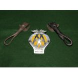 An AA badge and two vintage can openers