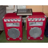 Two large speakers and a mixing deck