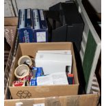 A box containing office stationery equipment