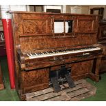 A walnut pianola piano .