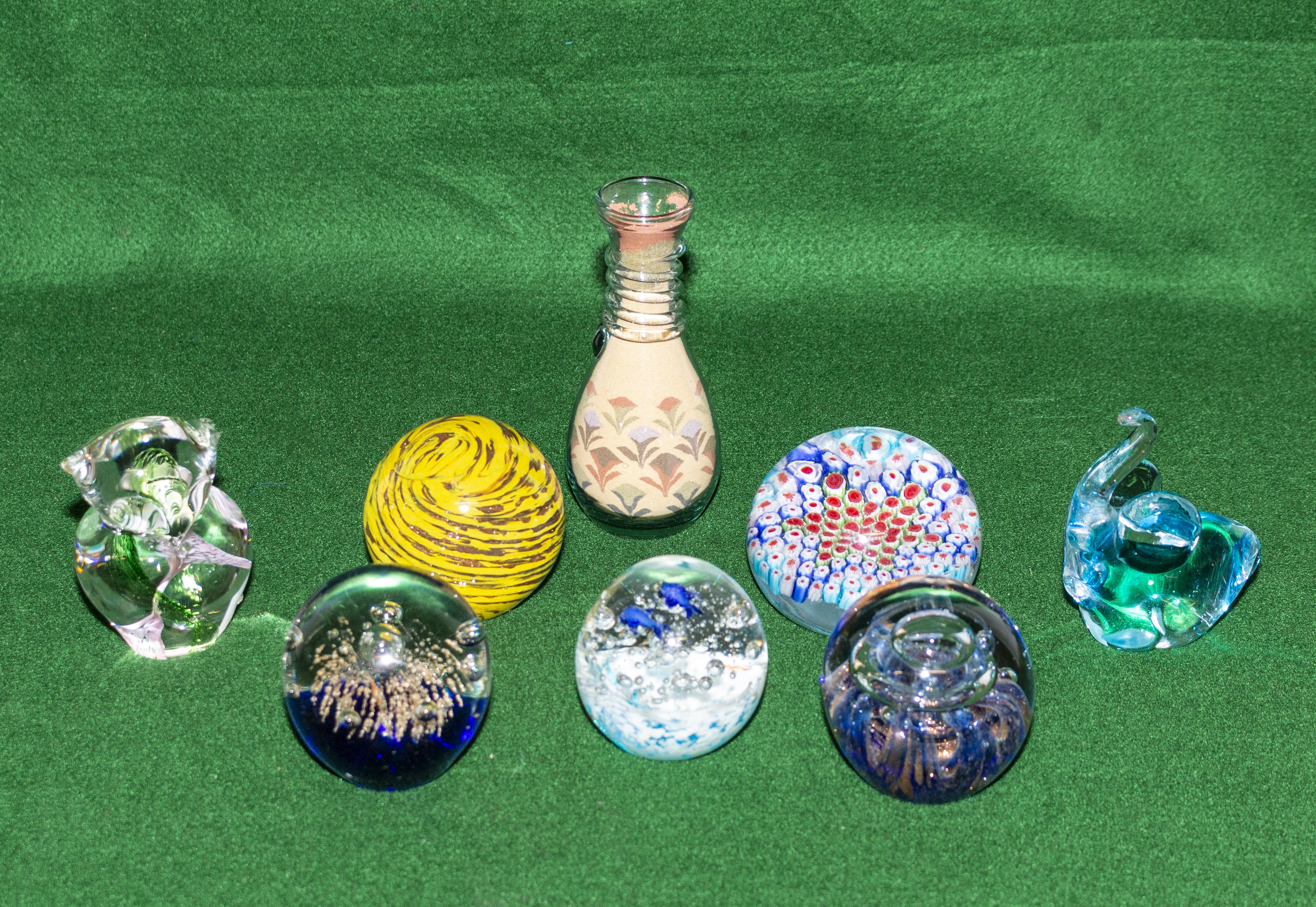 Five glass paper weights and other items