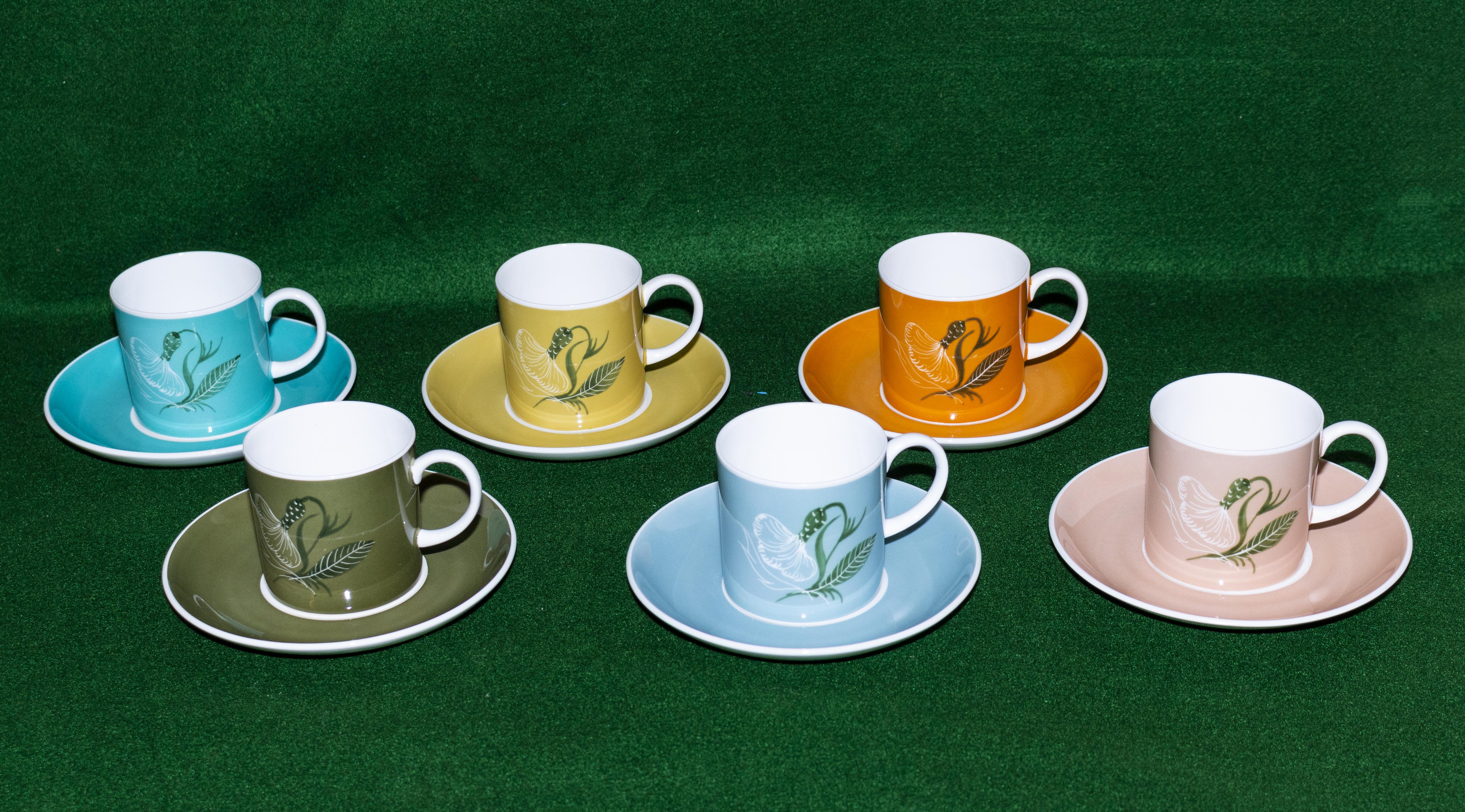 A set of six Susie Cooper coffee cans and saucers