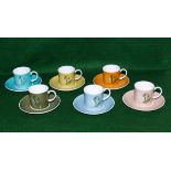 A set of six Susie Cooper coffee cans and saucers