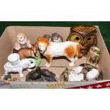 A box containing pottery animals