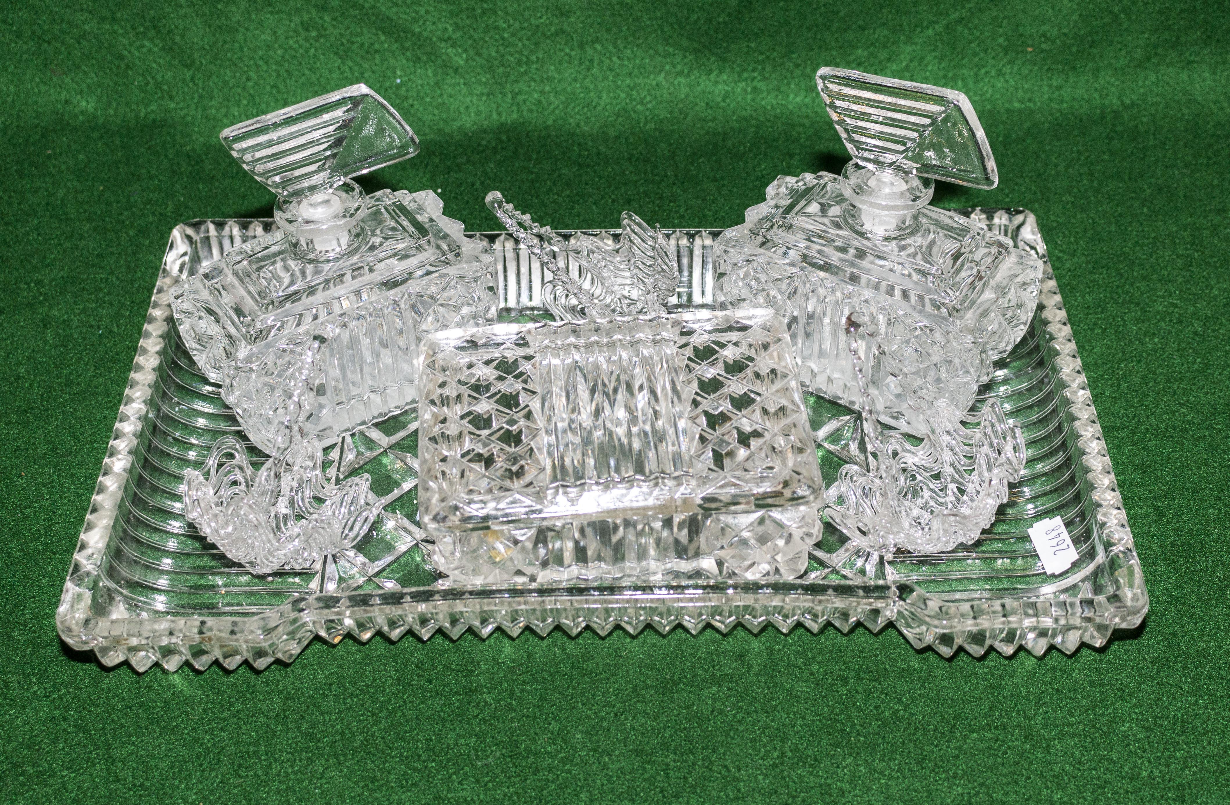 A glass trinket set.