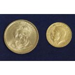A King George V half sovereign dated 1913 together with an Andrew Jackson $1 commemorative coin
