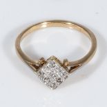 An 18ct gold ring set with diamonds, size P