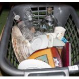 A basket containing assorted pottery and glass