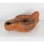 A small Roman oil lamp