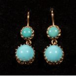 A pair of 9ct dropper earrings set with turquoise