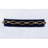 A 9ct gold and diamond bracelet