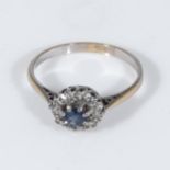 An 18ct gold sapphire and diamond cluster ring, size N