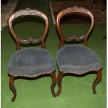 A pair of Victorian dining chairs