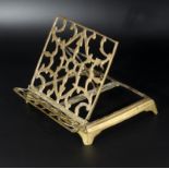 A brass book stand