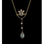 A 15ct gold pendant set with aquamarine and pearls