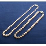 Two strings of pearls with silver diamante clasps