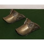 A pair of antique Venezuelan Conquistador brass open shoe solid stirrups