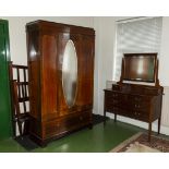 An Edwardian inlaid mahogany Wardrobe, dressing table and bed.