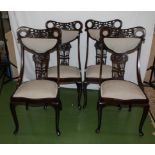 A set of four Edwardian very well shaped dining chairs. Nice condition.