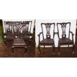 A set of eight Chippendale style mahogany dining chairs with ball and claw feet, matching lot 158