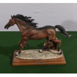 A Armani figure of a horse