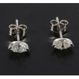 A pair of 18ct white gold marquise cut diamond studs, 48pt