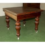 A Victorian mahogany draw leaf table