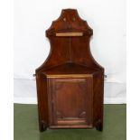 A late Victorian corner cabinet