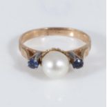 A 9ct gold pearl and sapphire ring, size S