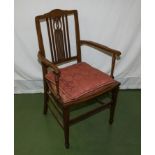 An Edwardian arm chair