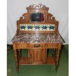 A very nice Edwardian washstand with marble top, tiles and mirror back.