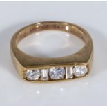 A gents 9ct gold three brilliant cut and two baguette diamonds, 1 carat, size O