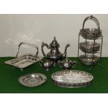 A silver plated cake stand, hors doevres dish, coffee service and other items