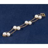 A child's gold and pearl bracelet