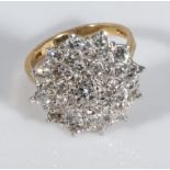 An 18ct gold large diamond cluster ring, 2+ carats, size O