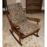 An Ercol style rocking chair