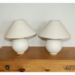 A pair of table lamps