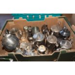 A box containing metal ware
