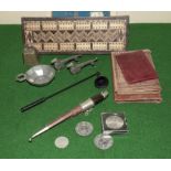 A cribbage board, wallets and other items