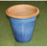 A large glazed plant pot