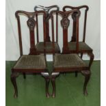 Four high backed dining chairs