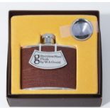 A boxed hip flask