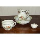 A jug, chamber pot and soap dish together with a washbowl