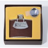 A boxed hip flask