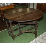 A period oak gale leg table.