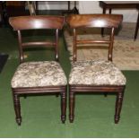 A pair of Victorian dining chairs