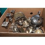 A box containing silver plated ware