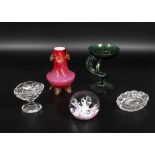 A glass paperweight, vaseline glass vase and three other items