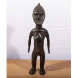 A small West African hand carved figure